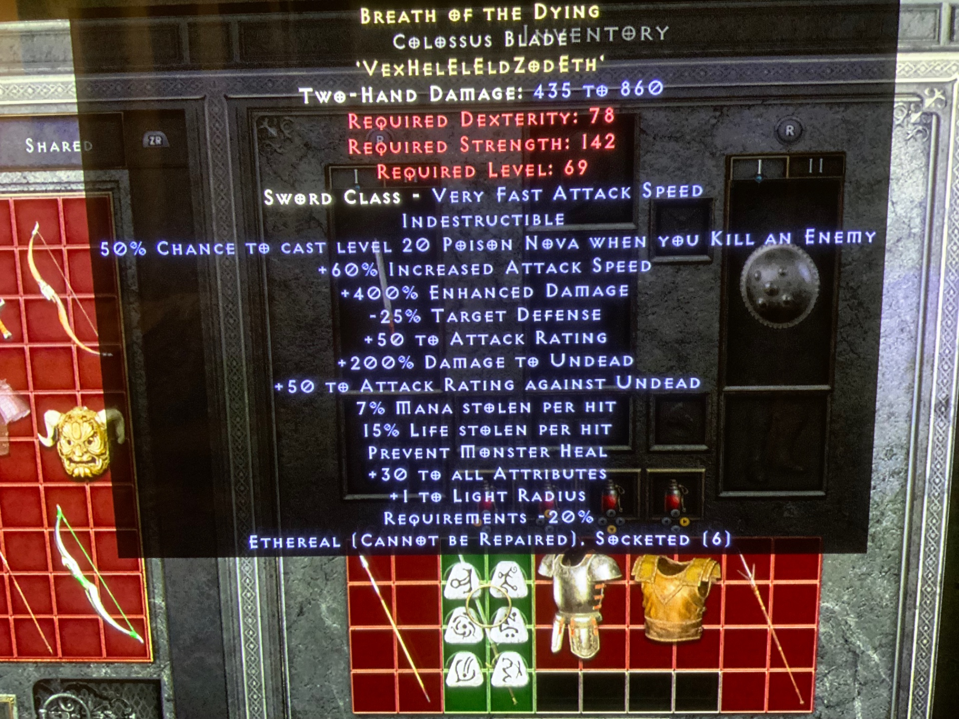 Colossus Bladeに付与されたBreath of the Dying。アイテム説明の周囲に共有保管箱と所持品のマス目が見え、装備やチャームが複数のマスを占めている。